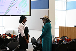  A student and a woman talk